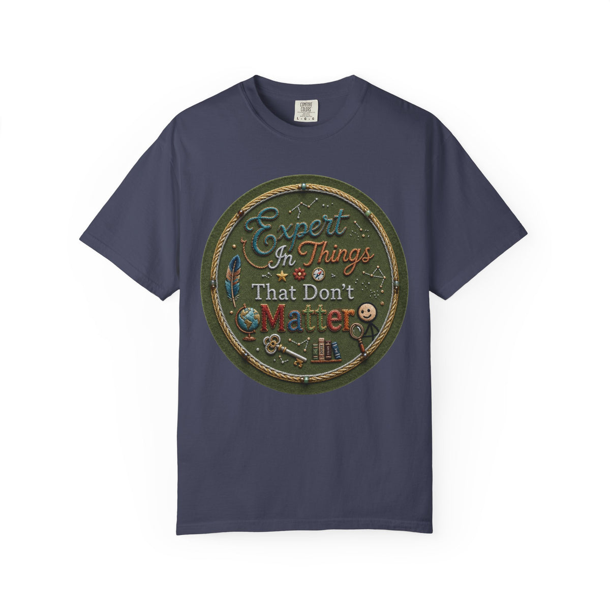 Color: Denim | Expert In Things That Don't Matter Unisex Garment-Dyed Tee