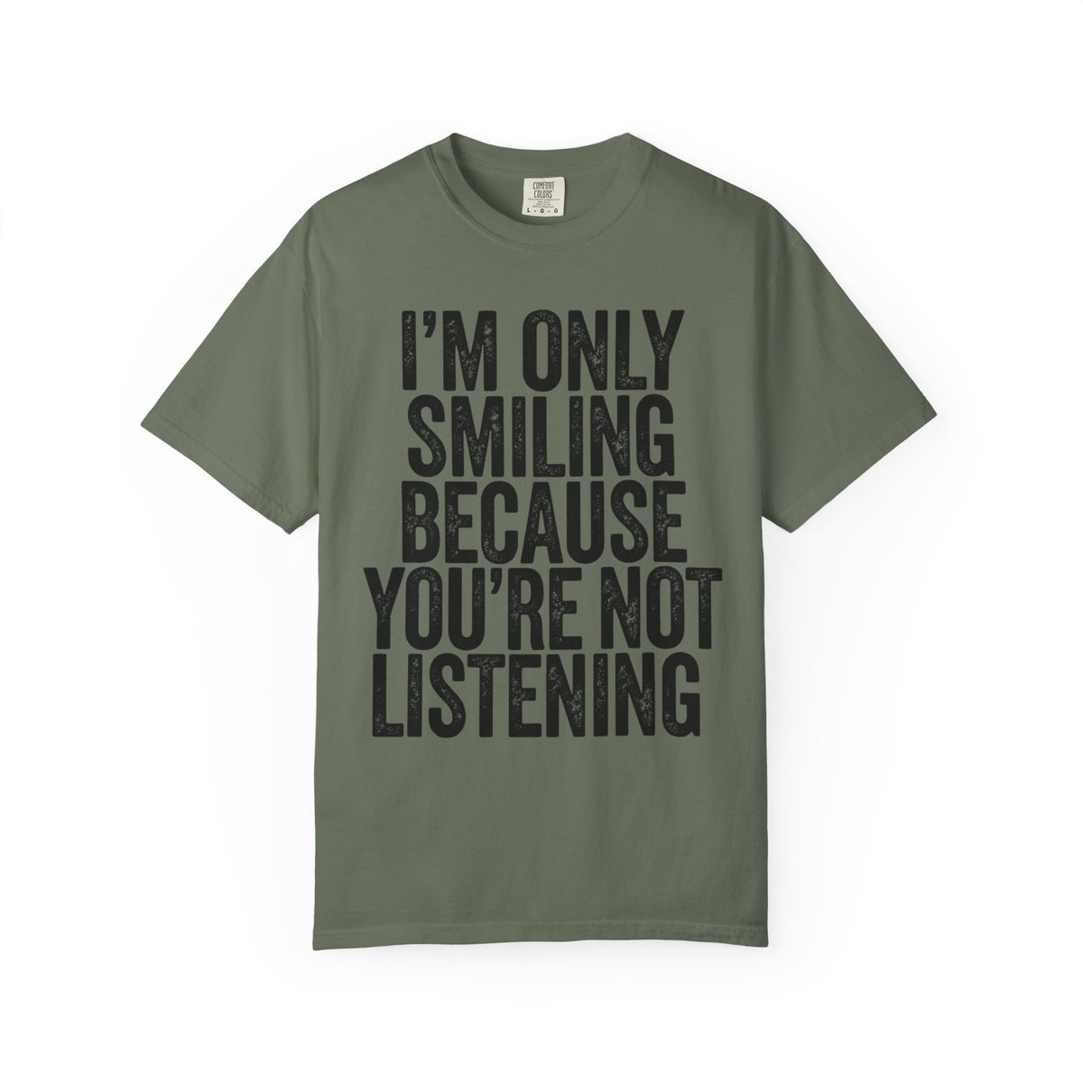 Color: Moss | I'm Only Smiling Because You're Not Listening Unisex Garment-Dyed Tee