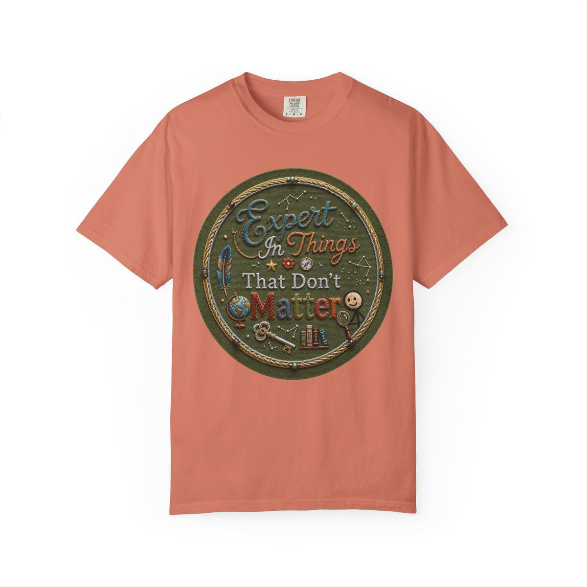Color: Terracotta | Expert In Things That Don't Matter Unisex Garment-Dyed Tee