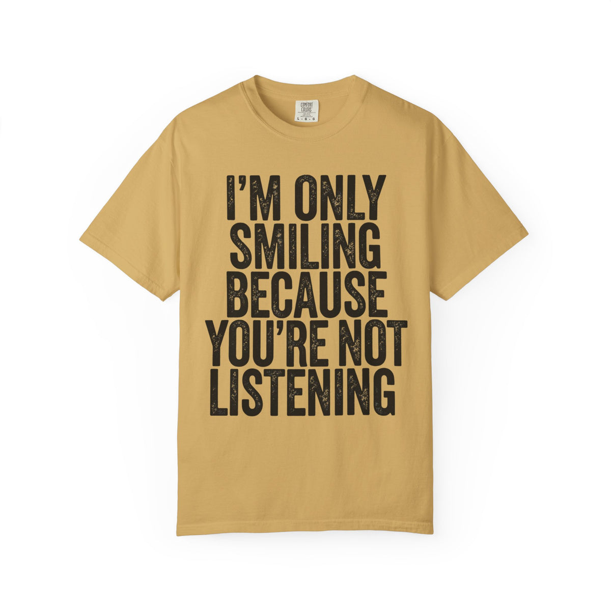 Color: Mustard | I'm Only Smiling Because You're Not Listening Unisex Garment-Dyed Tee