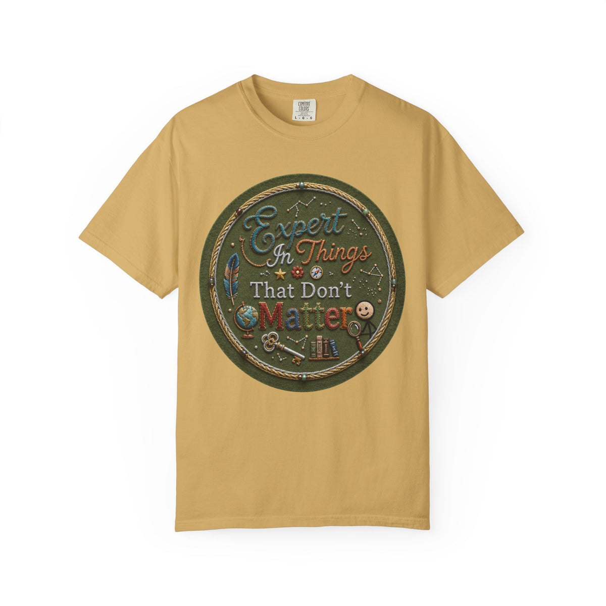 Color: Mustard | Expert In Things That Don't Matter Unisex Garment-Dyed Tee