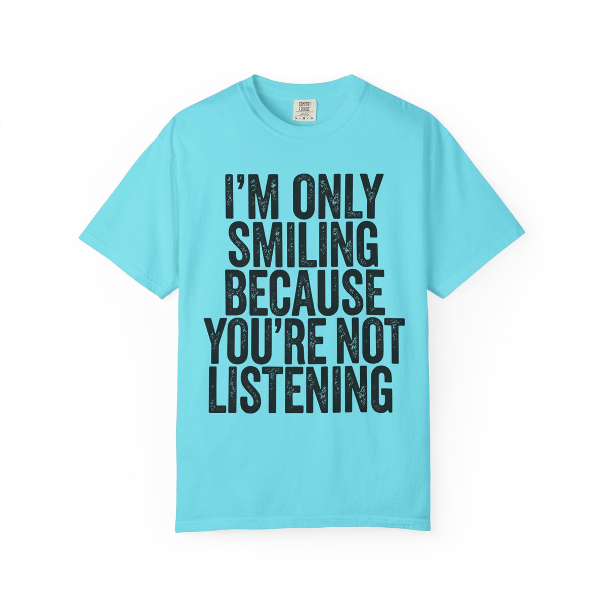Color: Lagoon Blue | I'm Only Smiling Because You're Not Listening Unisex Garment-Dyed Tee