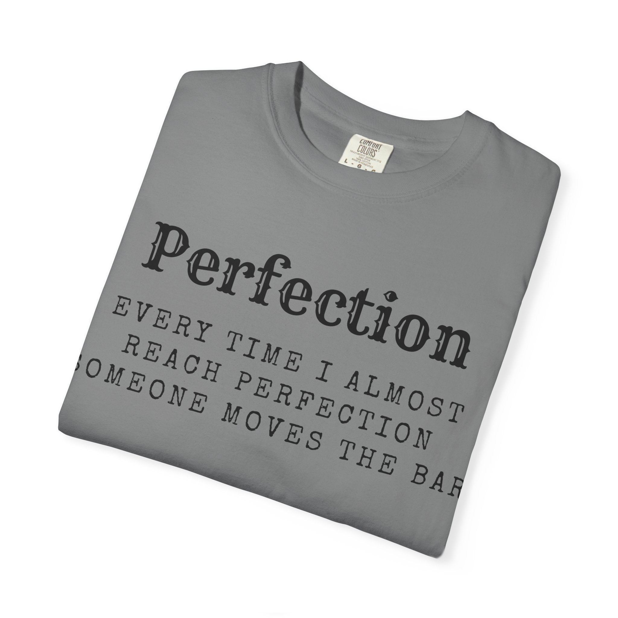 “Every Time I Almost Reach Perfection, Someone Moves the Bar” Unisex Garment-Dyed T-shirt