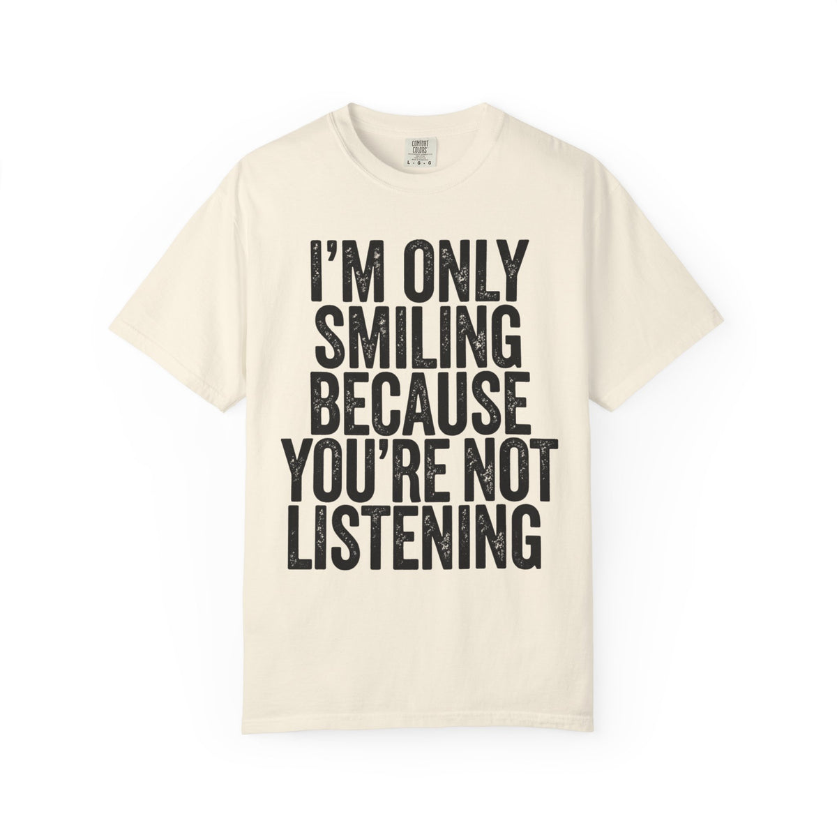 Color: Ivory | I'm Only Smiling Because You're Not Listening Unisex Garment-Dyed Tee
