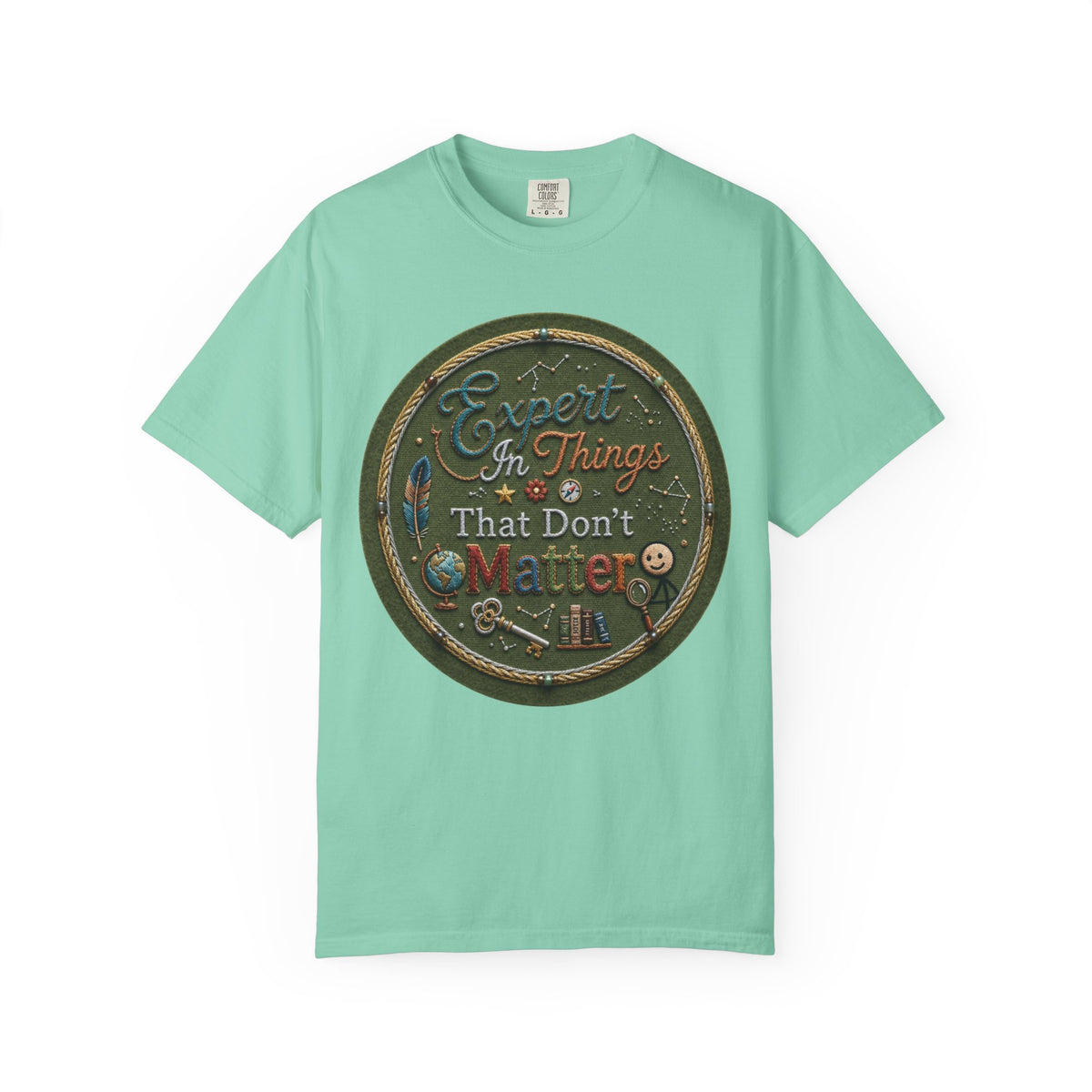 Color: Island Reef | Expert In Things That Don't Matter Unisex Garment-Dyed Tee
