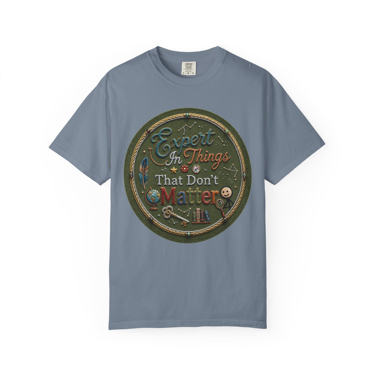 Color: Blue Jean | Expert In Things That Don't Matter Unisex Garment-Dyed Tee