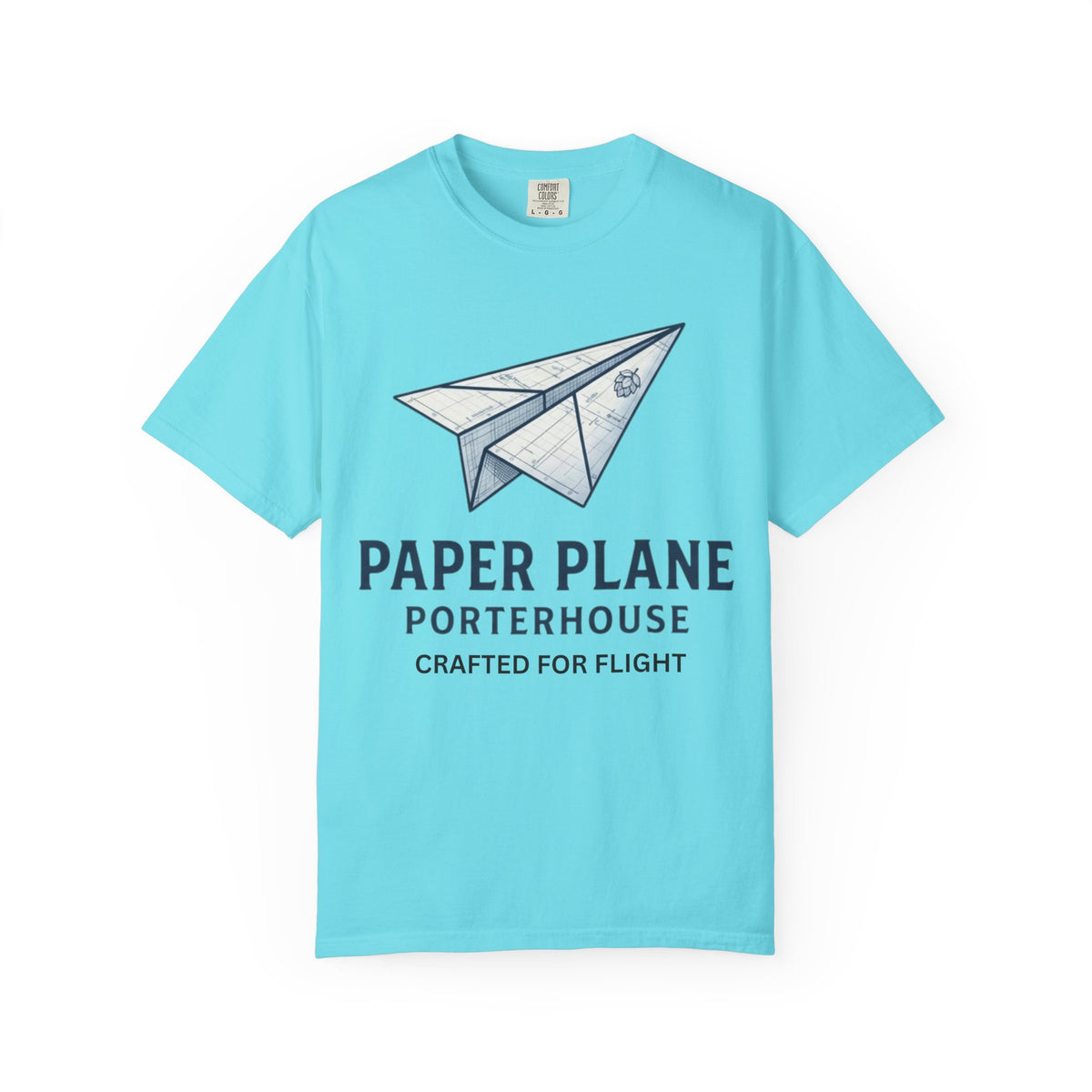 Color: Lagoon Blue | Paper Plane Porterhouse Unisex Garment-Dyed Tee