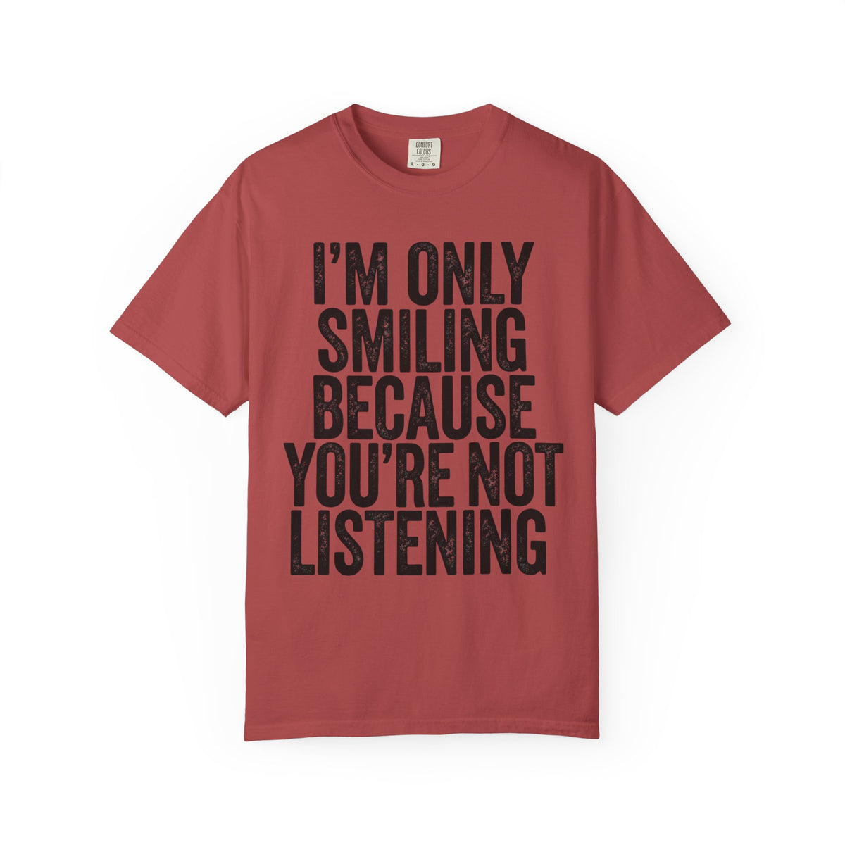 Color: Crimson | I'm Only Smiling Because You're Not Listening Unisex Garment-Dyed Tee