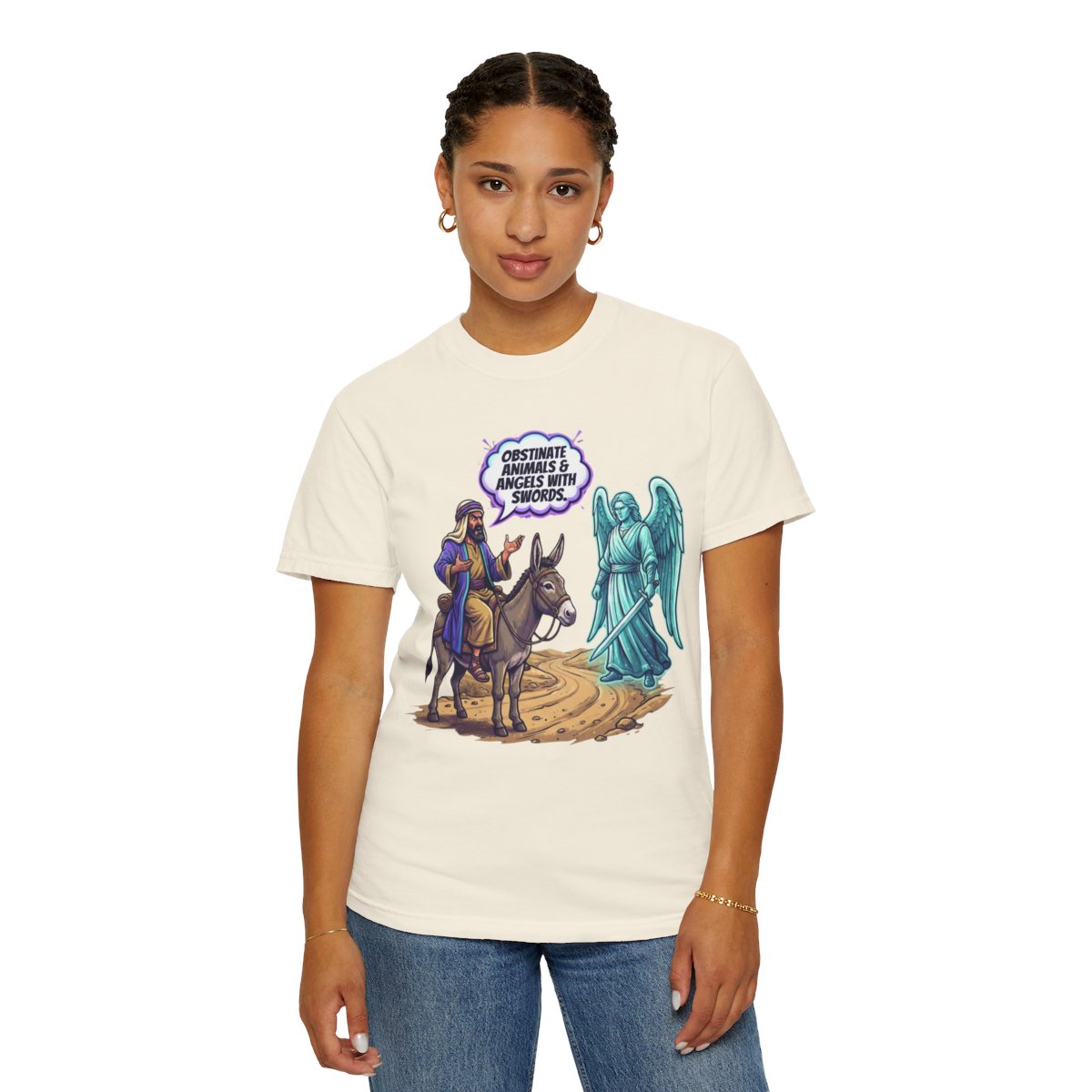 Color: Ivory | Good Book Series Obstinate Animals & Angels With Swords Unisex Garment-Dyed Tee